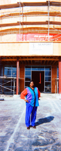 Photograph of Mayor Sharifa Wilson outside The Good Guys Construction Site
